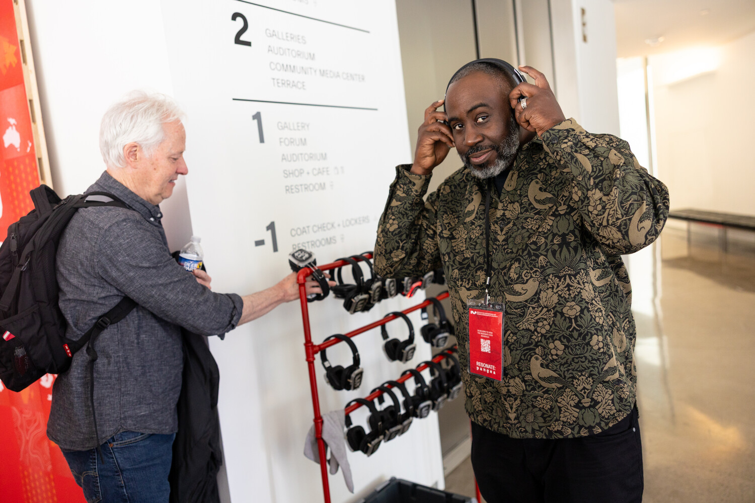 Attendee trying on festival headphones