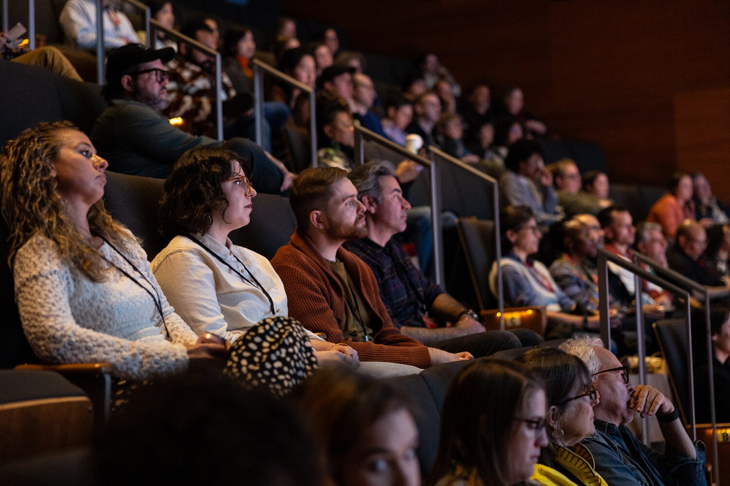 Audience watching a session in the auditorium